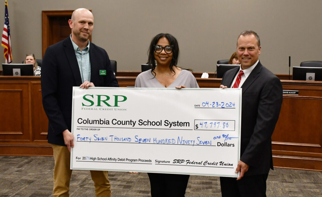 Affinity Debit Card Check Presentations Made to Local School Districts