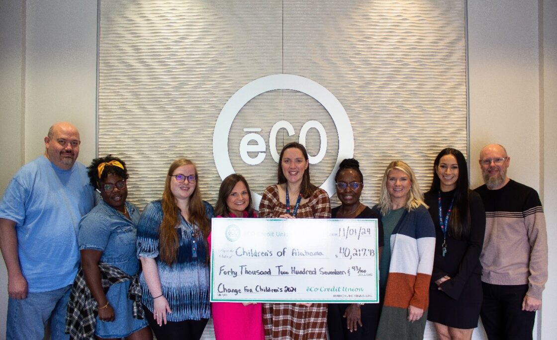 ēCO Credit Union employees present the check for Children’s of Alabama