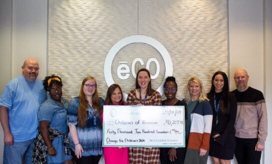 ēCO Credit Union employees present the check for Children’s of Alabama