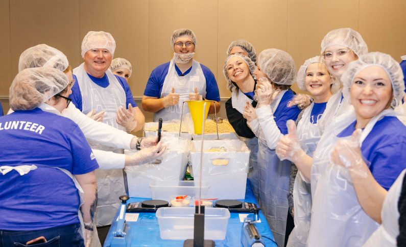 Family Savings CU Unites to Pack 50,000 Meal Kits on National Random Acts of Kindness Day