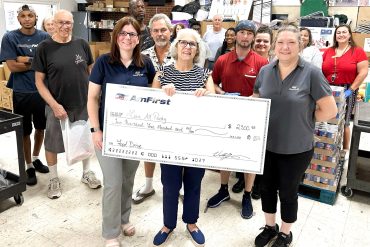 AmFirst’s 2025 Mobile Food Drive Raises $2,500 for Love All Pantry