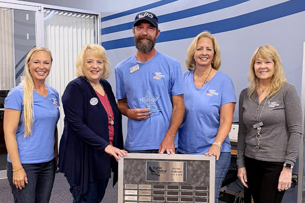 Andrew Funk receives Eglin Federal Credit Union’s Five-Star Performer Award for the second quarter of 2026